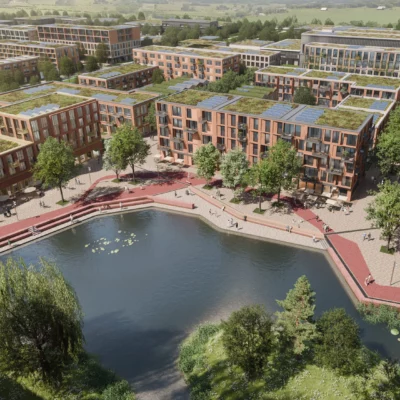 Visualisierung aus der Vogelperspektive vom zentralen Platz mit mehrgeschossigen Gebäuden und dem Fischbeker Teich